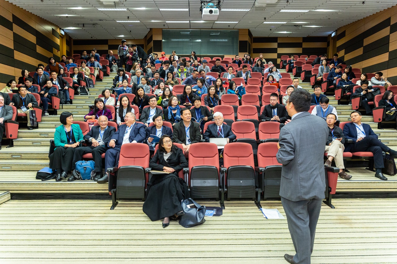 Rich Williams speaking to a large audience